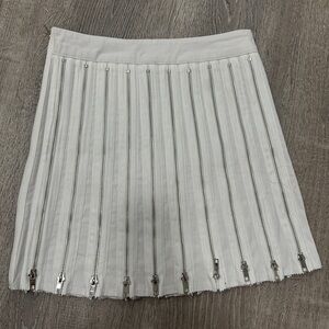 White skirt with silver zippers